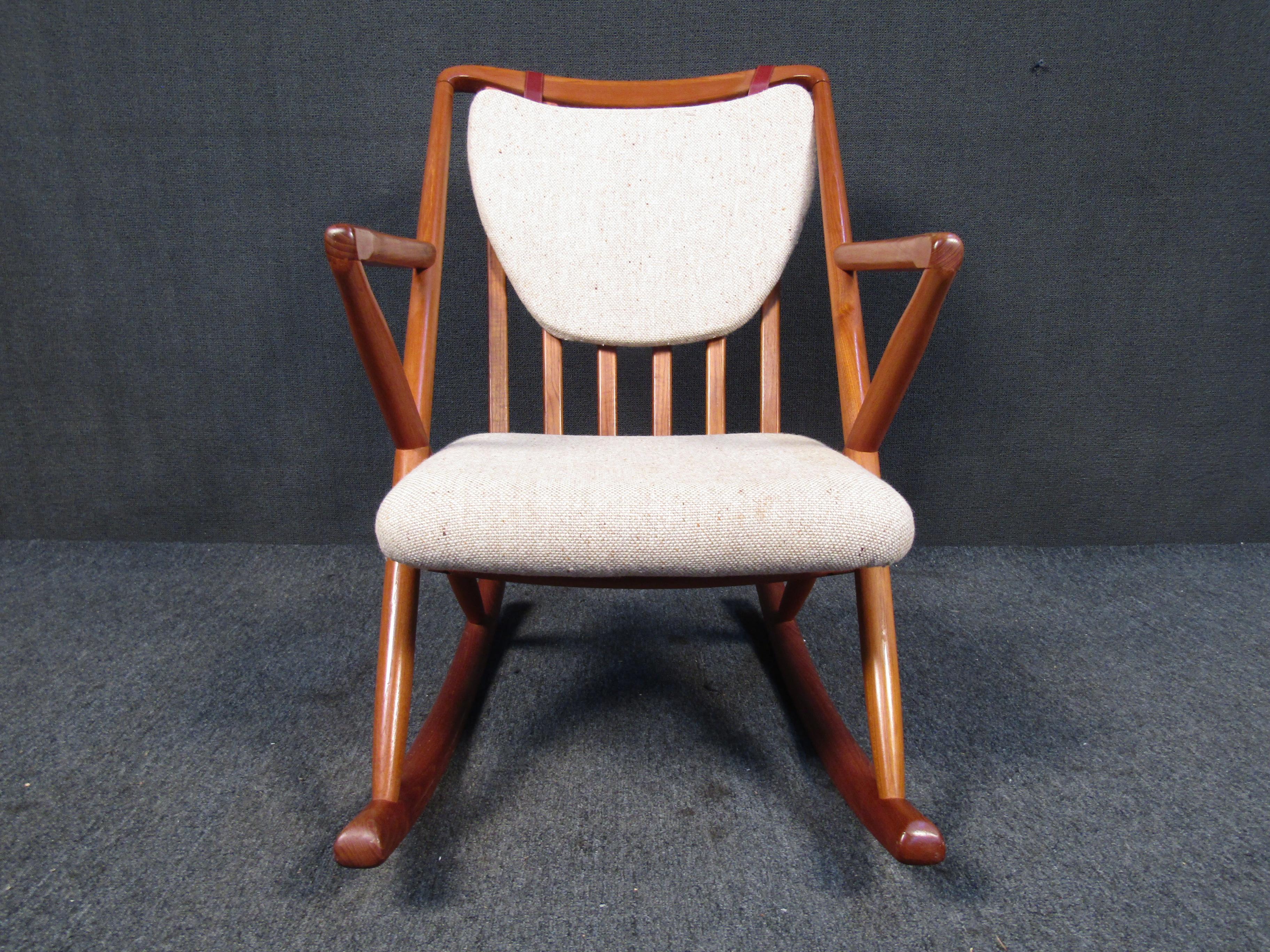 With an elegant design and spindle back, this vintage Danish rocker in the style of Benny Linden is full of Mid-Century Modern style. Please confirm item location with seller (NY/NJ).