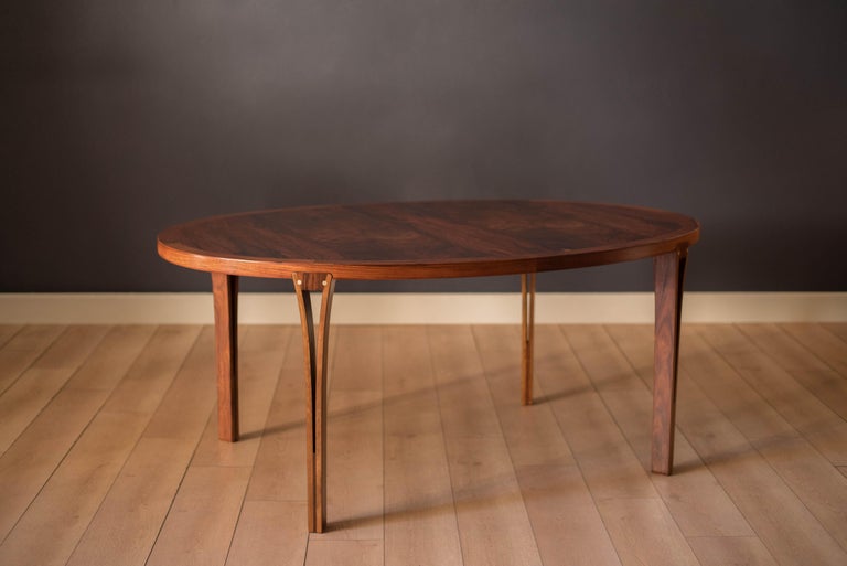 Vintage Danish Rosewood and Brass Oval Extension Dining Table In Good Condition For Sale In San Jose, CA