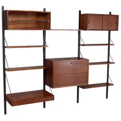 Vintage Danish Royal Wall Mounted Shelving System in Teak by Poul Cadovius