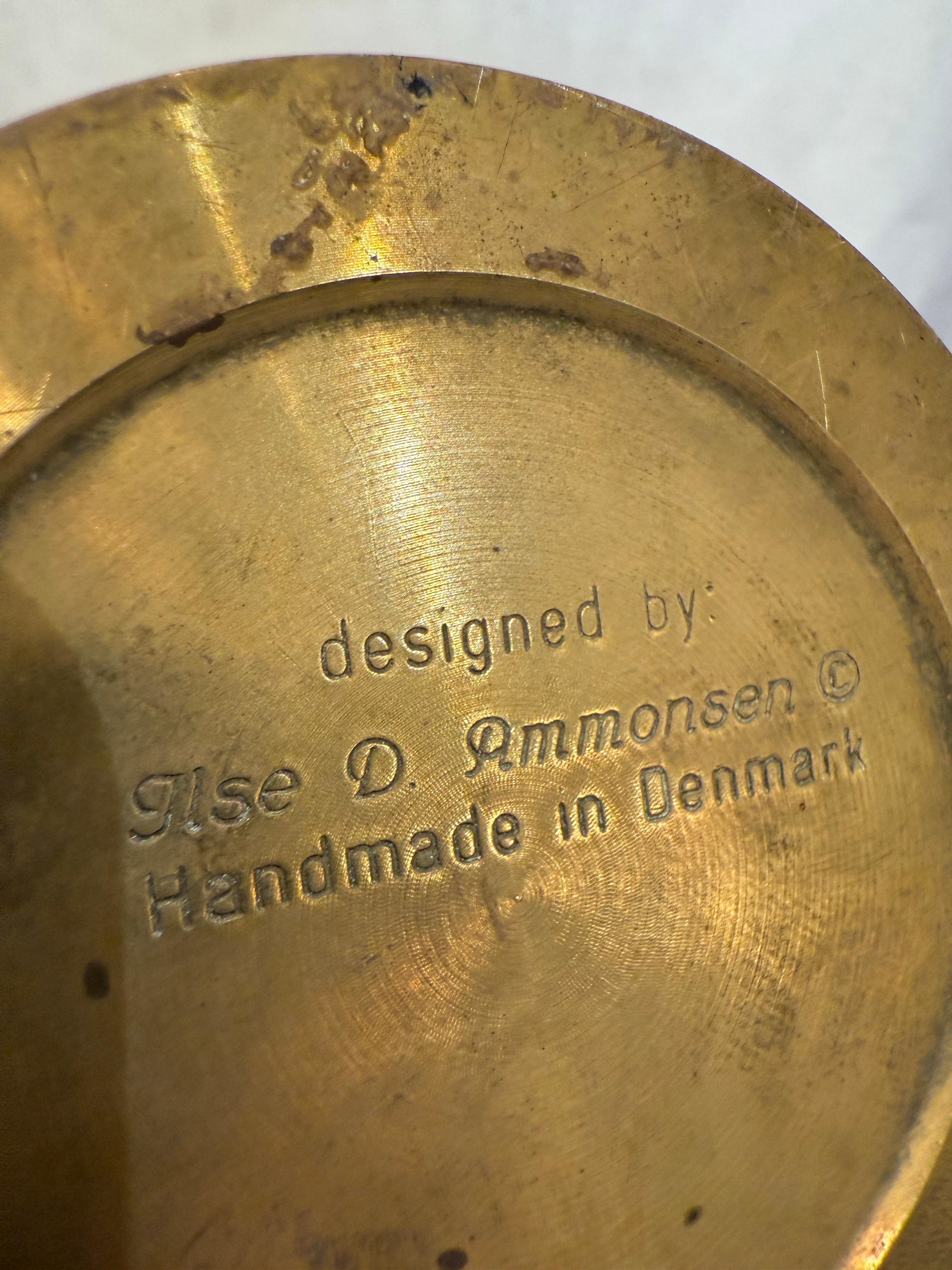 Vintage brass midcentury solid brass oil lamps designed by Ilse Ammonsen for Daproma - Denmark.  These lamps used for ships swing to keep them level, they are adjustable at the stem.  Each one stamped on the base.  Runs on normal lamp oil.  Priced