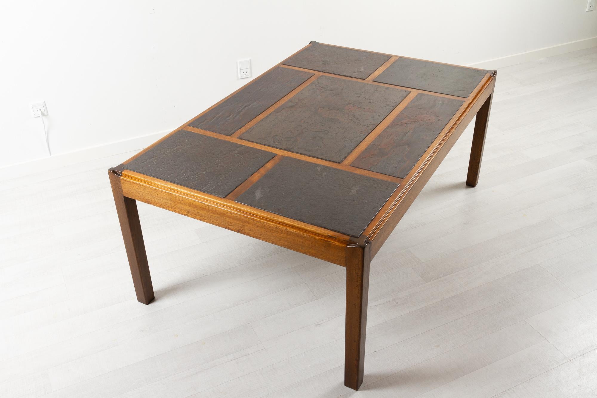 Vintage Danish slate and mahogany coffee table by Svend Langkilde 1970s
Large and heavy Danish Mid-Century Modern coffee table designed by Danish architect Svend Langkilde and made by his own company Langkilde Møbler in Denmark.
Rectangular table