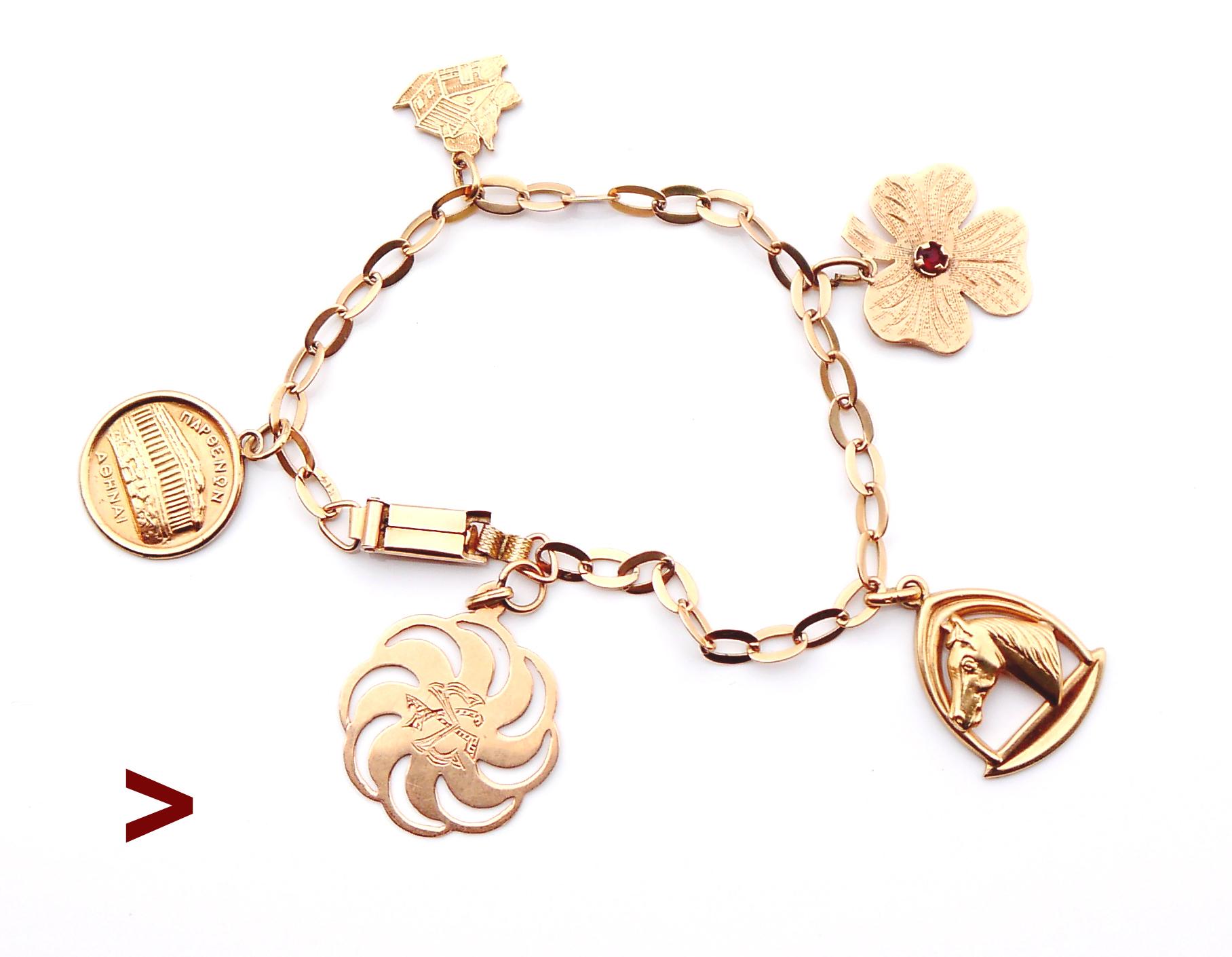 Beautiful Danish anchor chained charm bracelet made /charmed in in 1950s - 1960, in perfect used condition.

Chain in solid 14K Yellow Gold. Unique combination of 5 nice looking charms. All will tingle if you move your hand.. All hallmarked K14/