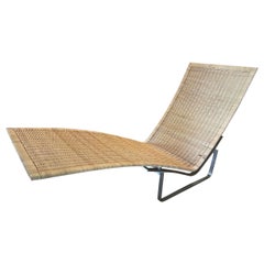 Silla chaise longue de mimbre estilo danés vintage con estructura de acero