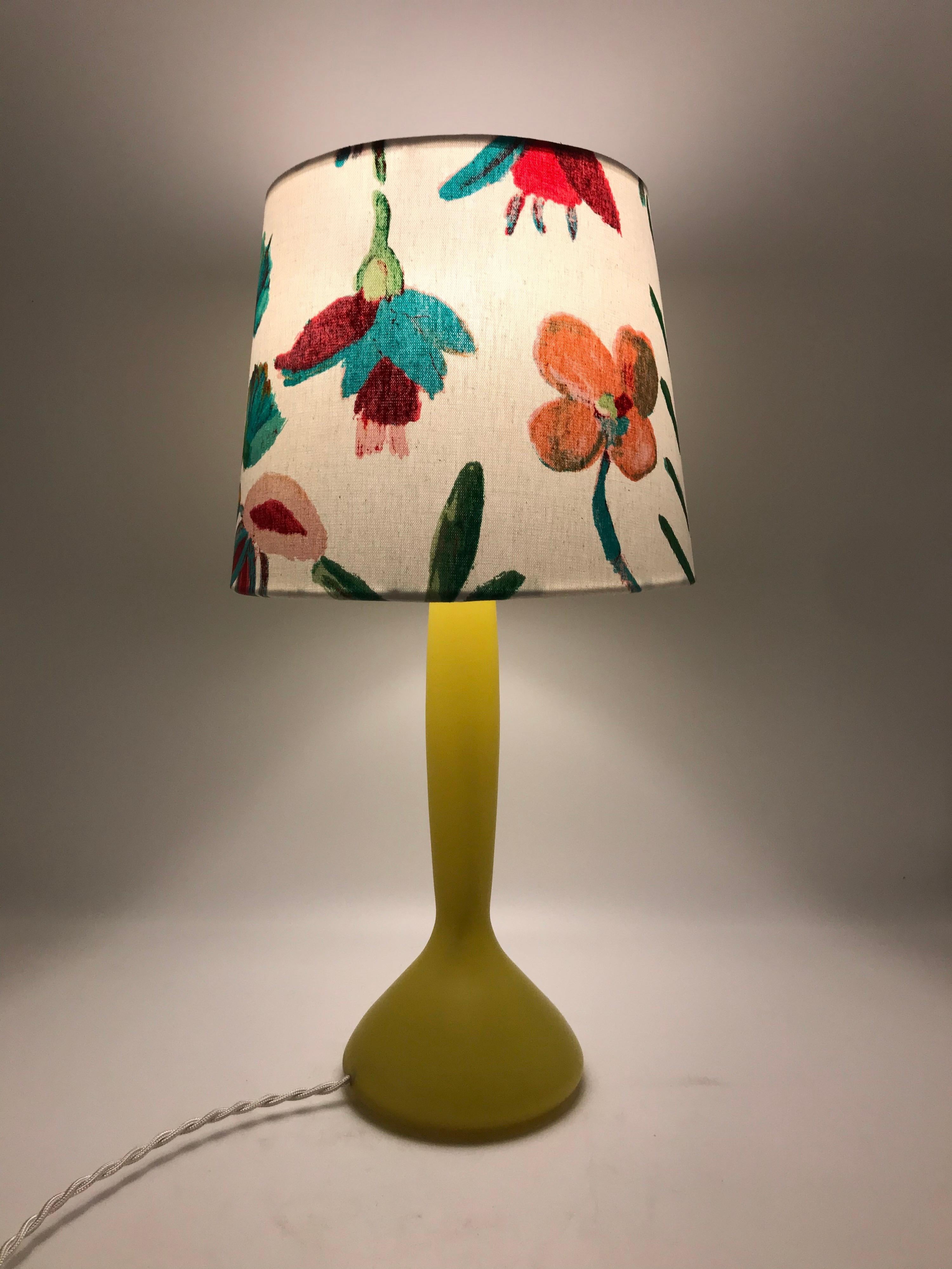 Vintage Danish table lamp by Kastrup glass for Holmegaard.
The hand blown lime green glass is in great condition with very little surface wear and it still has the Kastrup glass sticker on the base.
The lamp is rewired and can be delivered with an