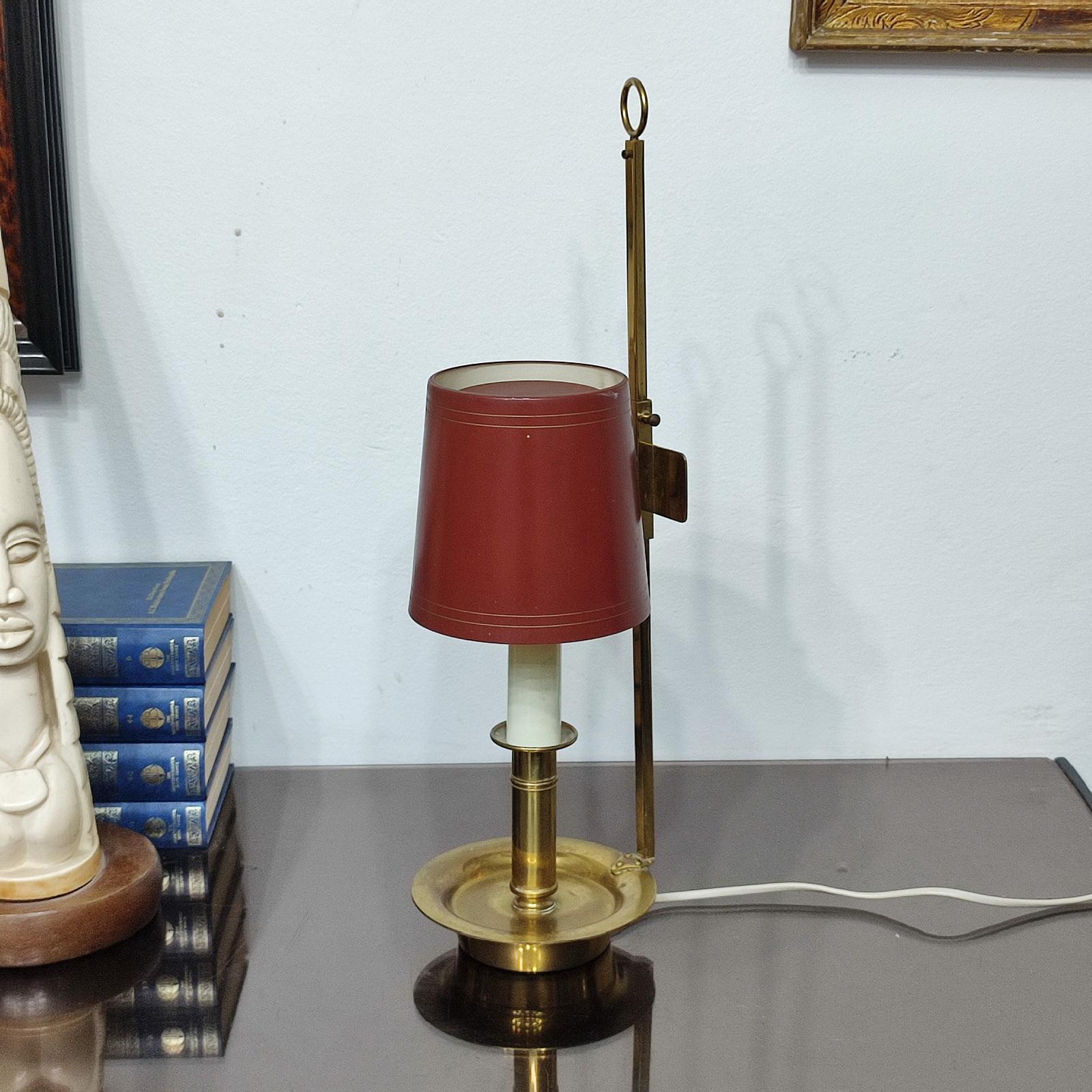 Vintage Danish brass reading table lamp by TH Valentiner Copenhagen
Exclusive and stylish table lamp made of brass mounted with rust-red shade in metal.
The lampshade can be adjusted up and down. Very good original condition,