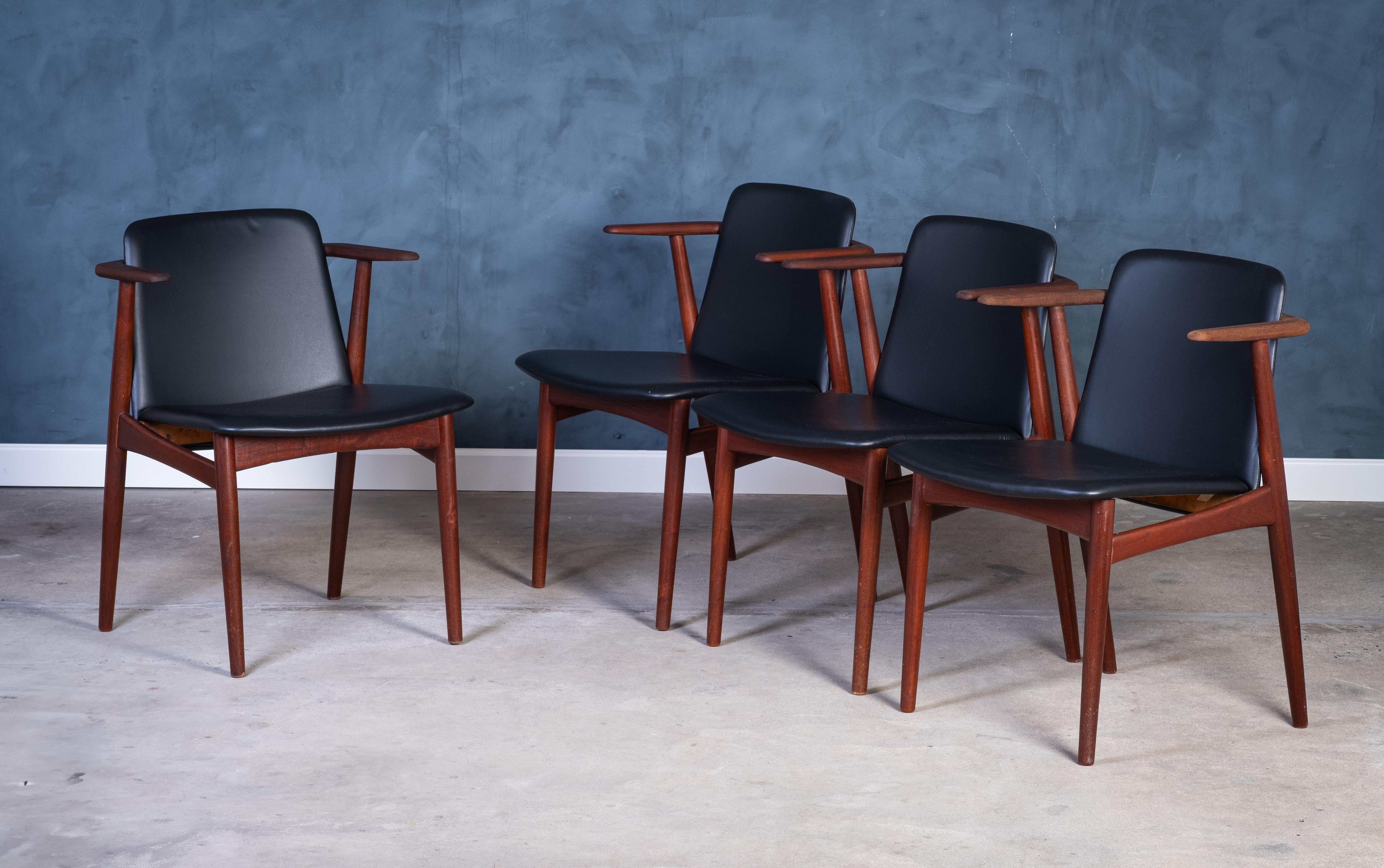 Beautiful set of four armchairs designed by Hans Olsen in the 1960s, crafted from solid teak wood. These classic Danish modern chairs have been newly reupholstered with high-quality black leather, combining timeless design with renewed comfort.

The