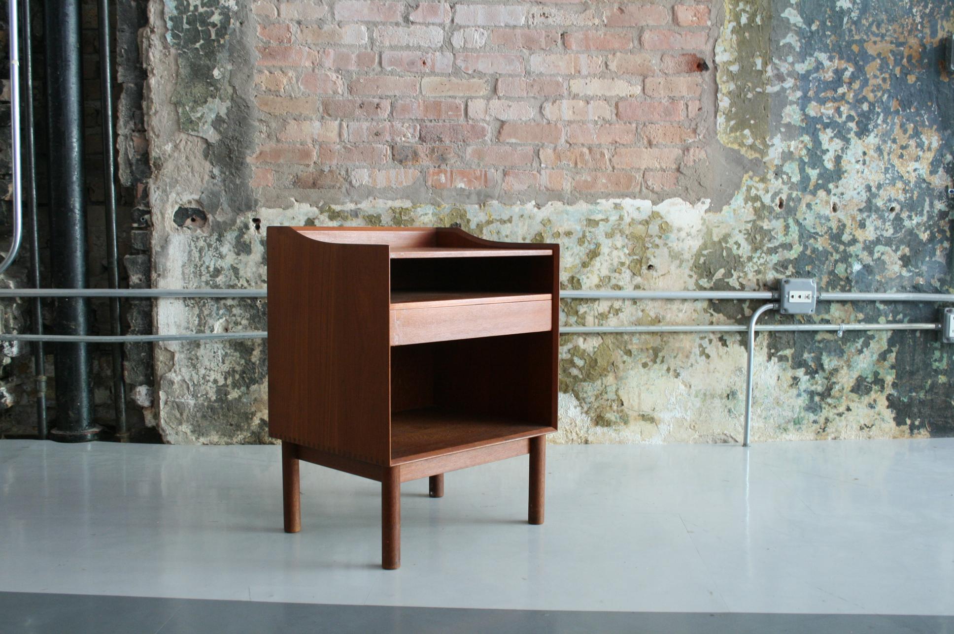 Solid Teak bedside table or nightstand by Peter Hvidt & Orla Molgaard Nielson. Made by Søborg Møbler in Denmark. Very Good Condition.