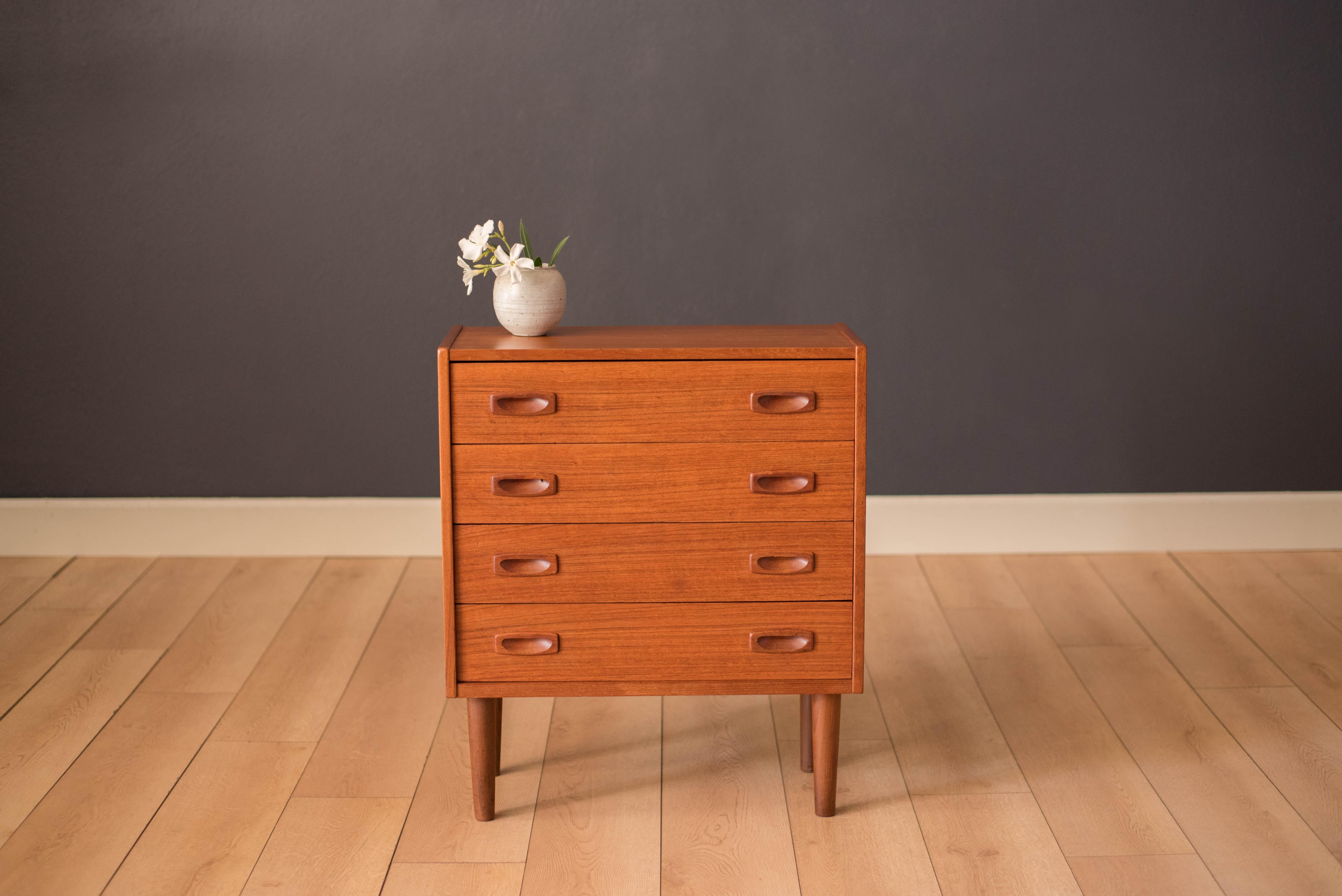 Mid-Century Modern small dresser chest in teak, circa 1960s. This piece includes four dovetailed drawers with sculpted handles and curved side edges. Its unique shape and size make it perfect for an entryway/hallway piece or nightstand.


Offered by