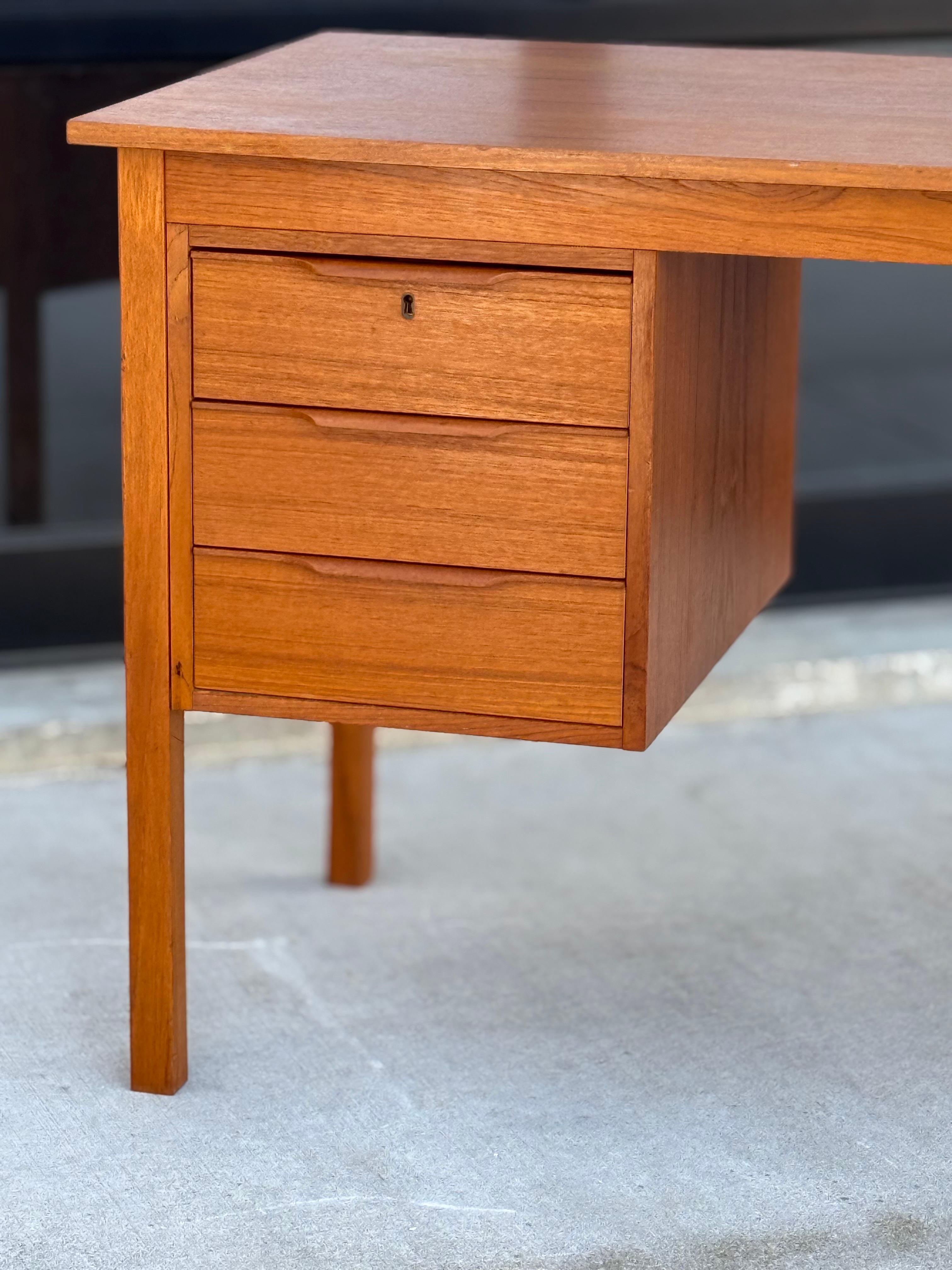 Vintage Danish Teak Desk with Finished Back by Bent Silberg Mobler 7