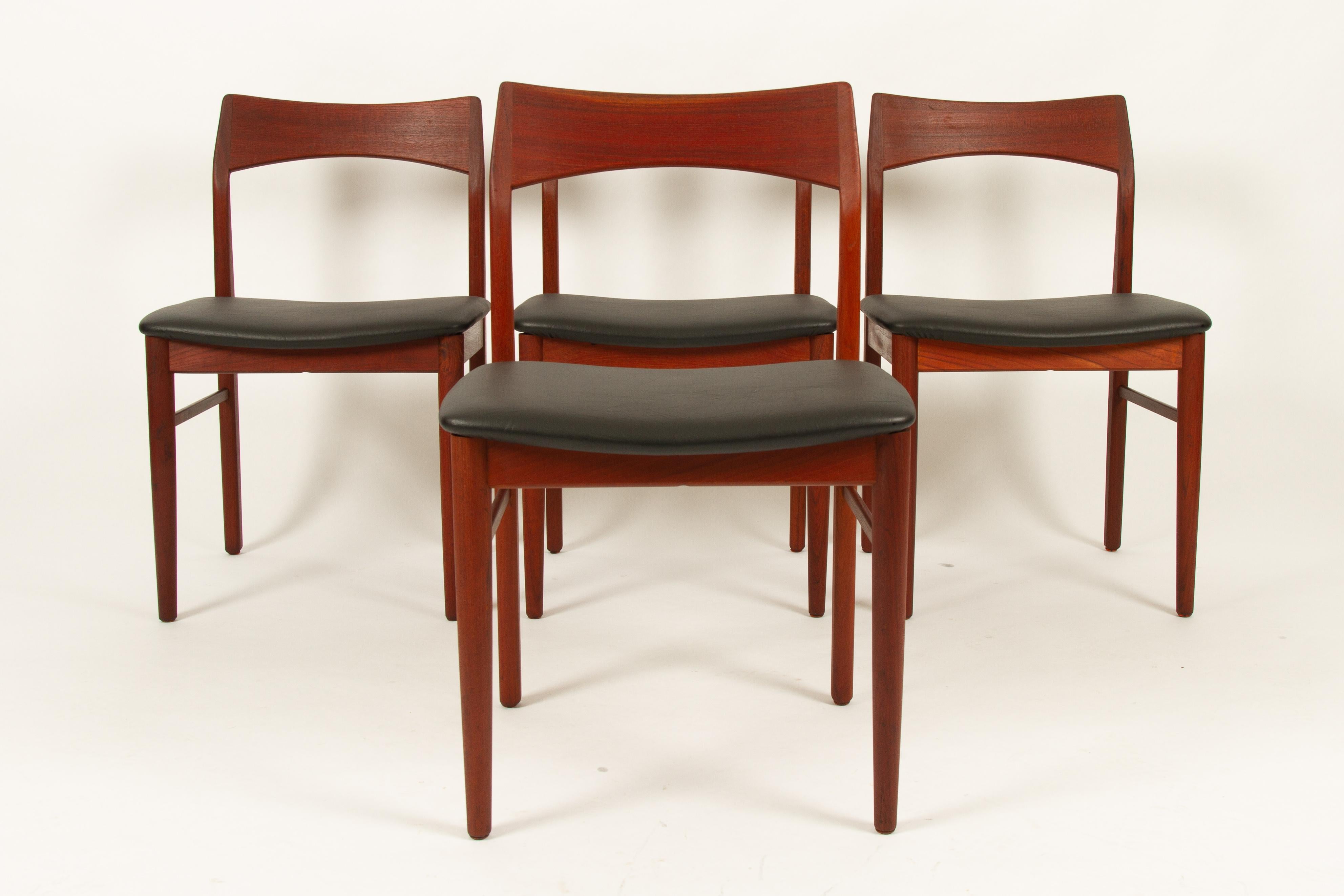 Set of four Danish Mid-Century Modern dining chairs designed by Danish architect Henning Kjærnulf and made by Vejle Stole- og Møbelfabrik in 1960s.
Solid teak frame with tapered legs. Curved backrests in solid teak that angles backwards for better