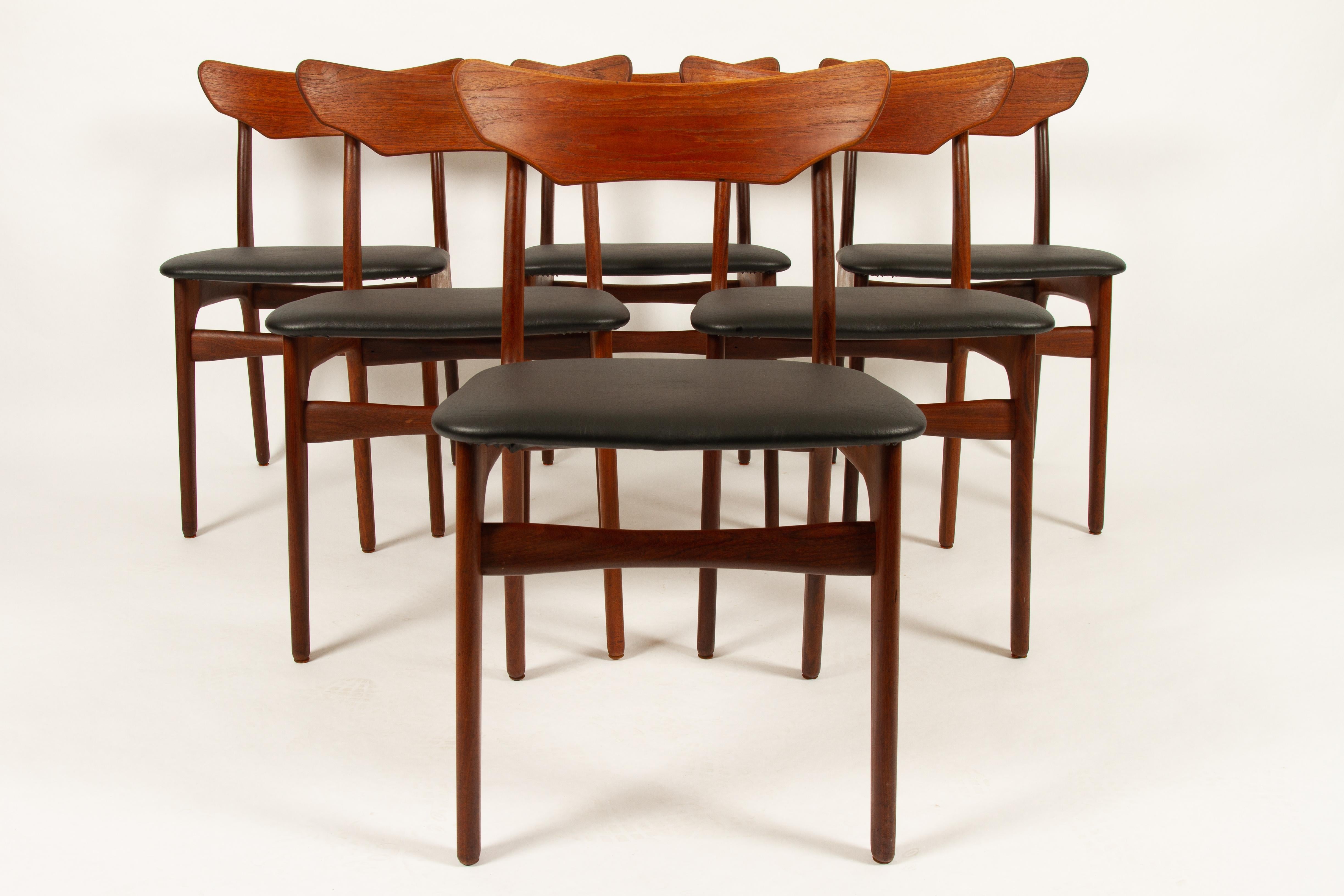 Beautiful set of six midcentury teak dining chairs. Sculpted backrests and a solid teak frame. Restored and reupholstered for maximum comfort, ready to enjoy. A classic Danish modern chair.