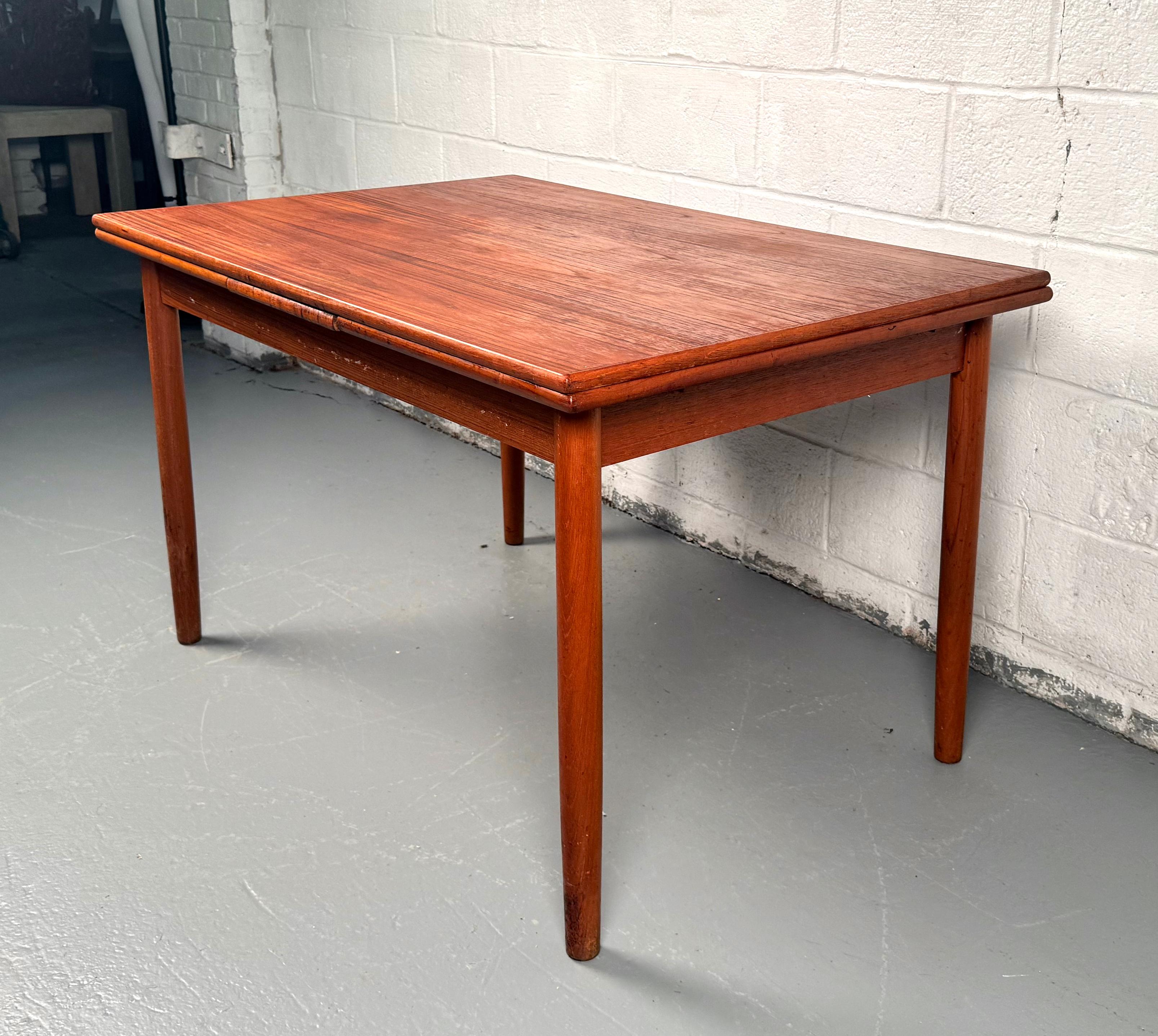 Mid-Century Modern Vintage Danish Teak Draw-Leaf Dining Table For Sale