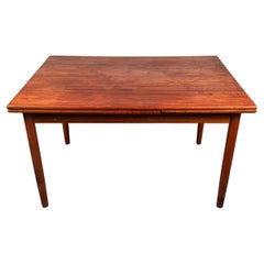 Mesa de comedor danesa vintage de teca con tablero extensible