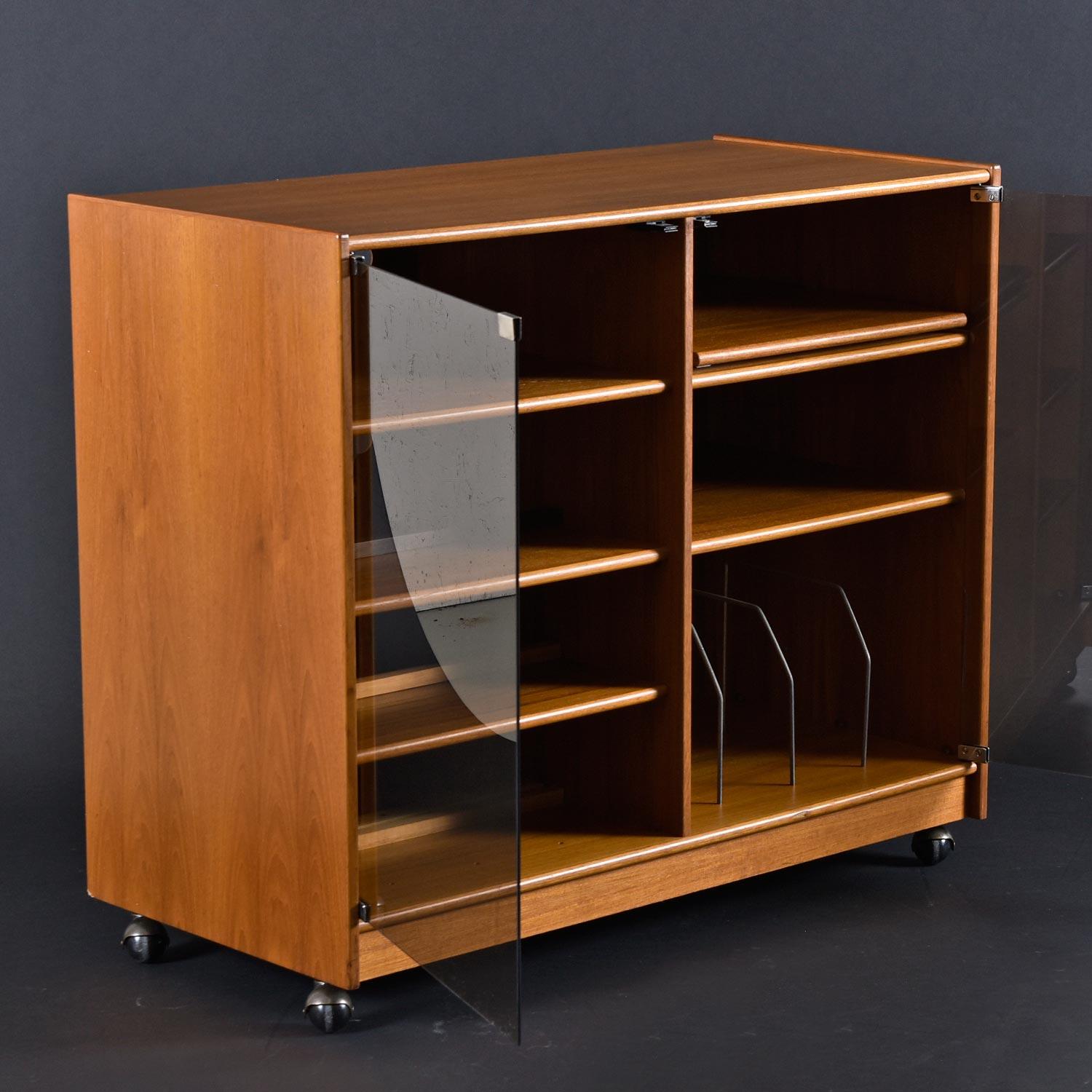 A rare and momentous find! This Nineteen-Laties era (1970s-1990s) vintage stereo cabinet is the perfect storage solution for audio enthusiasts. It seems whenever we are looking for a stereo cabinet, they are no where to be found. These babies pack