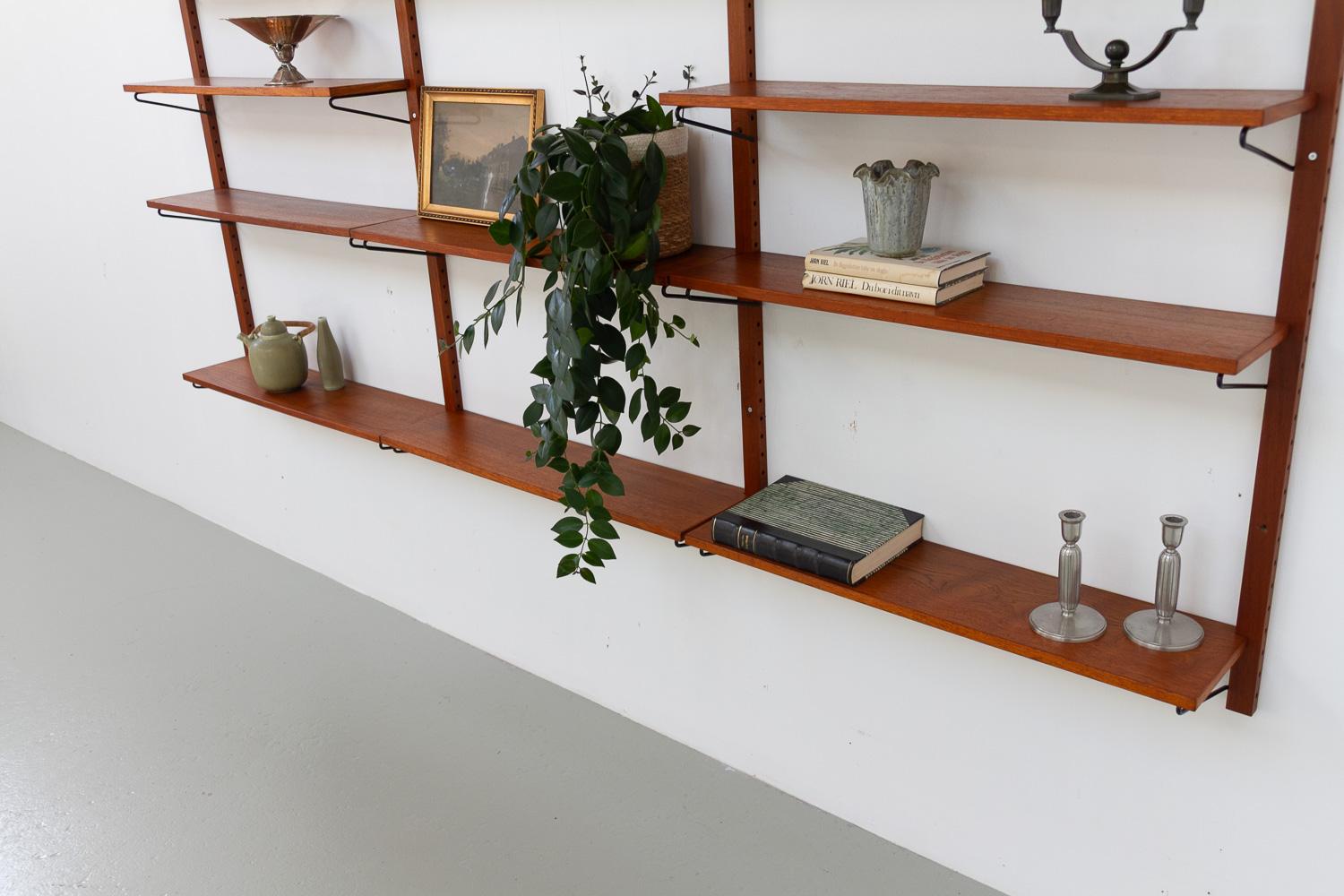 Danois Vintage Danish Wall Mounted Teak Shelving System, 1960s. en vente