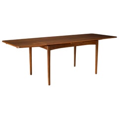 Vintage Danish Walnut Extendable Dining Table by Arne Hovmand-Olsen