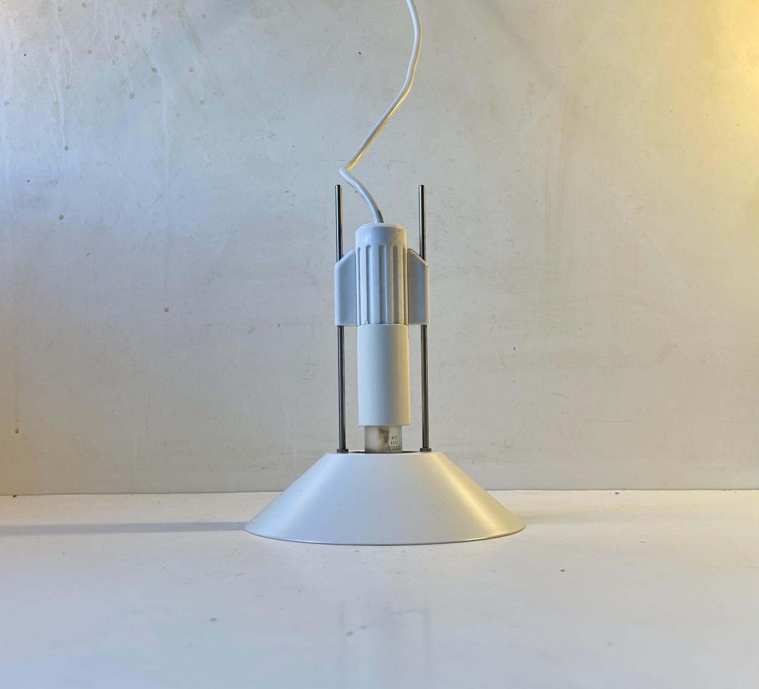 A vintage white pendant designed and manufactured by Lyfa in Denmark during the 1970s. The bulb can be height-adjusted allowing you to change the intensity of the light. Measurements: H: 21 cm, D: 17 cm.