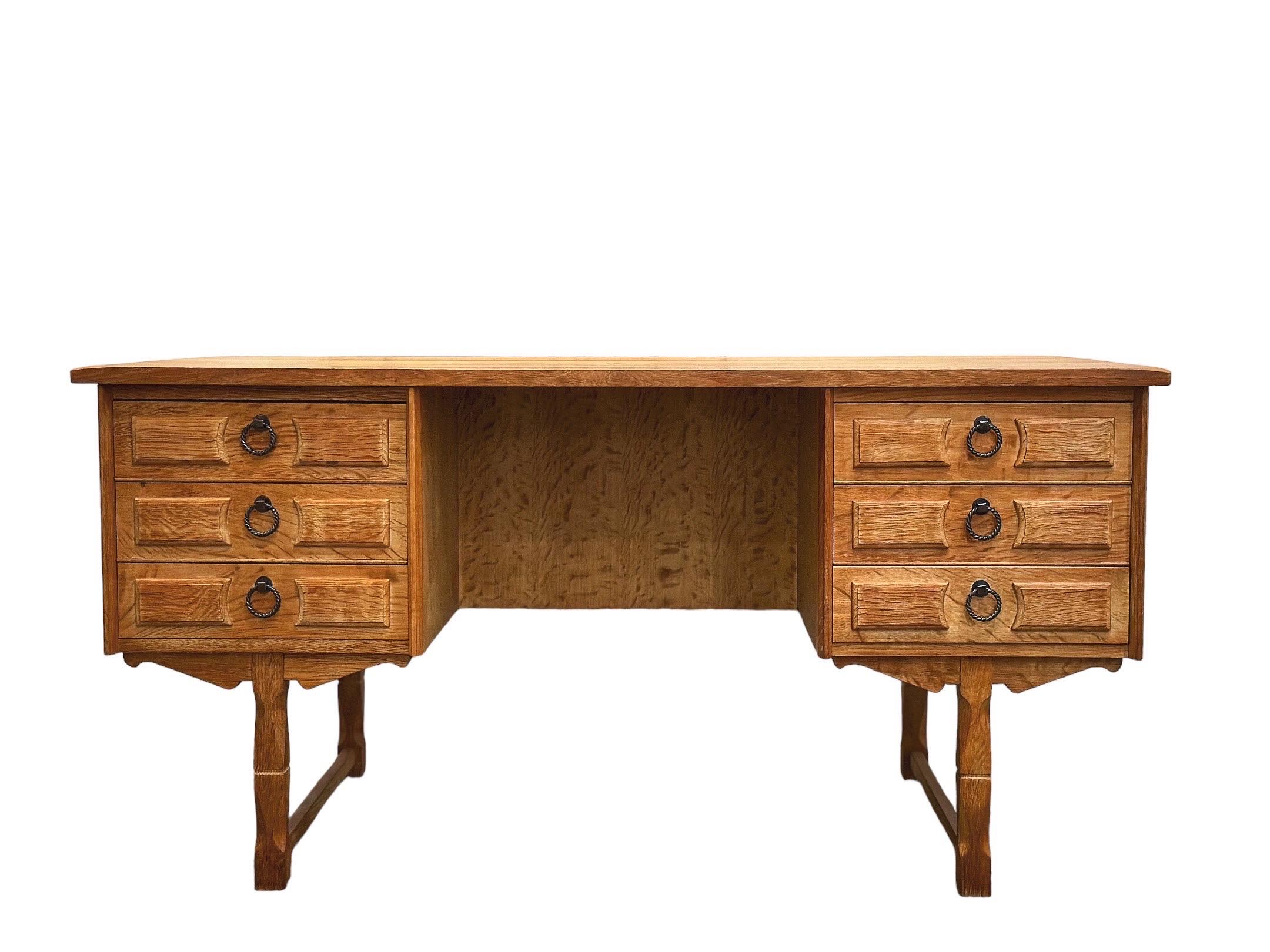 Vintage executive writing desk in Nordic white oak by Henning Kjaernulf. Exquisite Danish design and craftsmanship. Finished with cubbies on the backside allowing the desk to be featured floating in a room. Six drawers. Staved solid oak top features