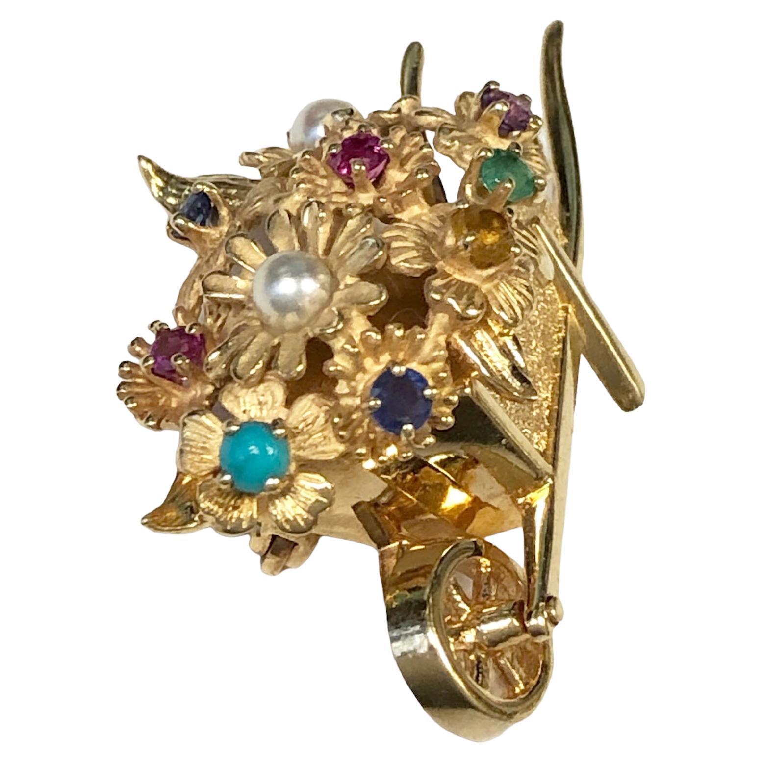 Circa 1960s Henry Dankner & Sons New York Dankner 14k Yellow Gold Wheel Barrow Brooch, measuring 1 3/8 inches in length X 3/4 inch, very detailed and set with numerous Gemstones. 