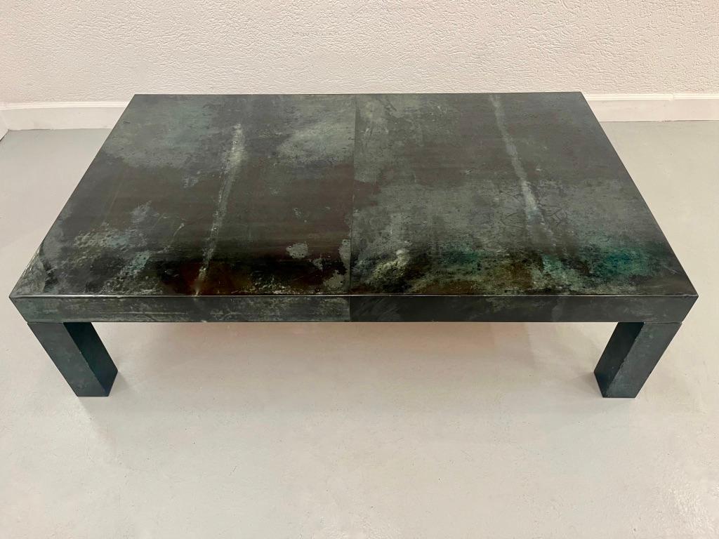 Dark green varnished goat skin on wooden structure coffee table by Aldo Tura, Italy ca. 1970s
Minors imperfections on the varnish here and there ( see pictures ) 
L 130 x D 80 x H 35 cm
Aldo Tura, one of the most enigmatic and polarizing figures in