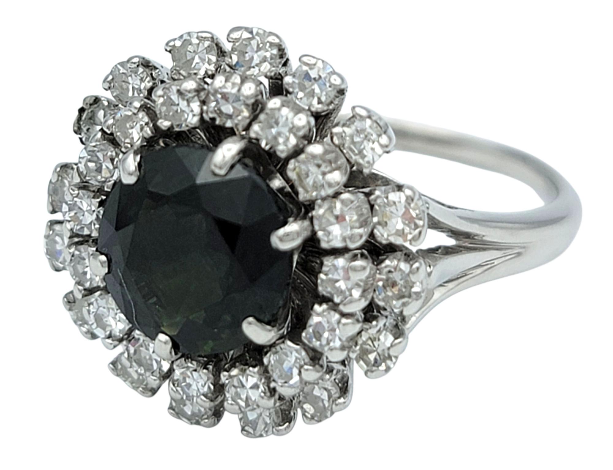 Contemporary Vintage Dark Green Sapphire with Double Diamond Halo Ring in 14 Karat White Gold For Sale