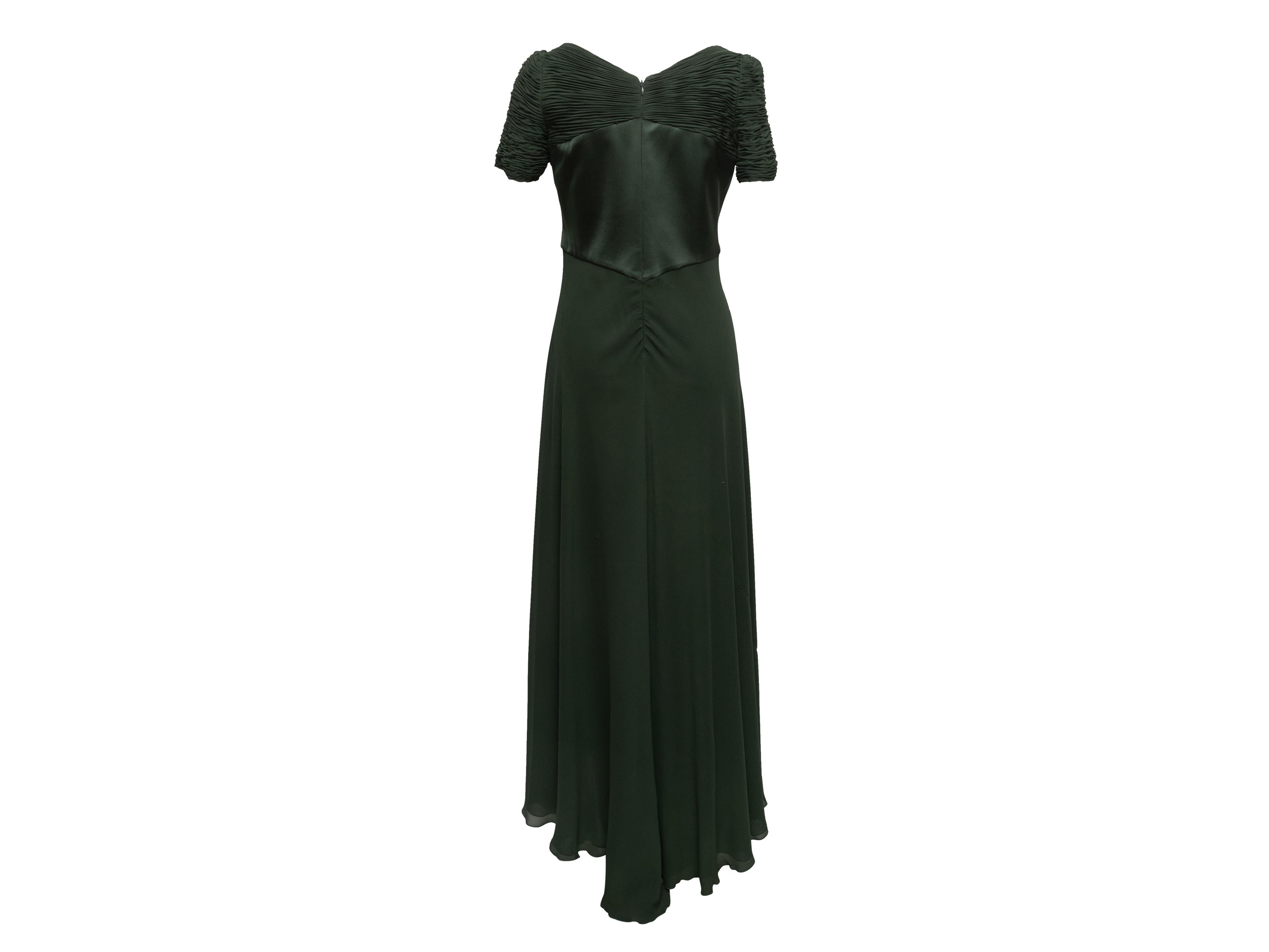 Vintage dark green silk short sleeve gown by Valentino. V-neck. Ruching throughout bodice. Zip closure at center back. 38