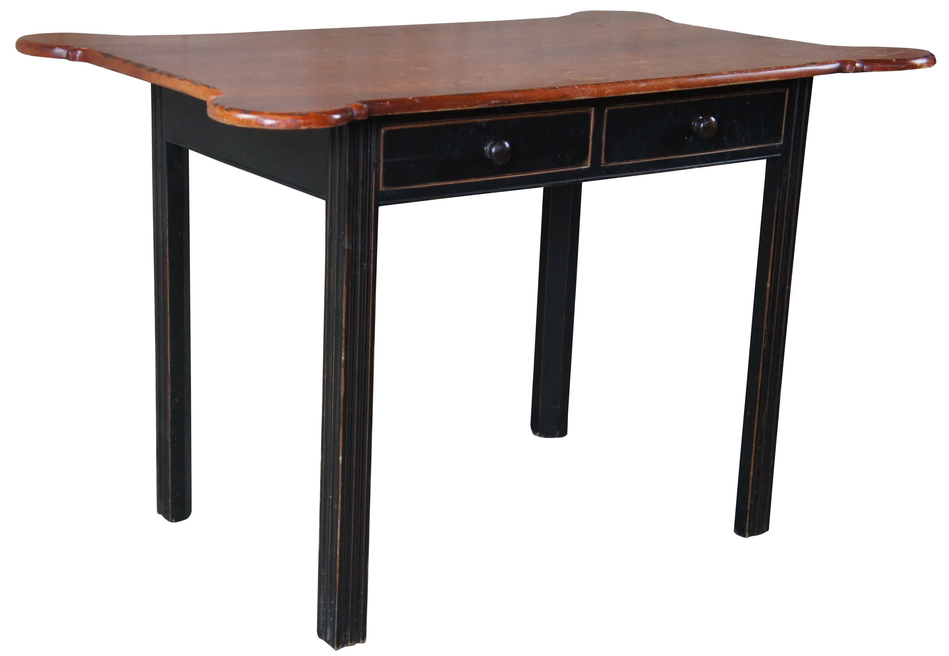 Late 20th century porringer top table by David T Smith. Features a parcel ebonized base in traditional fasion with fluted legs. Includes two dovetailed drawers marked on the underside, circa 1986.
 