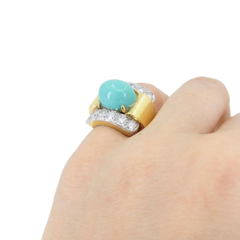 This vintage David Webb ring, dating back to the 1980s, is a striking example of the designer’s iconic style. Crafted from 18k gold, the band features Webb’s signature hammered texture, adding dimension and character to the piece. The center of the