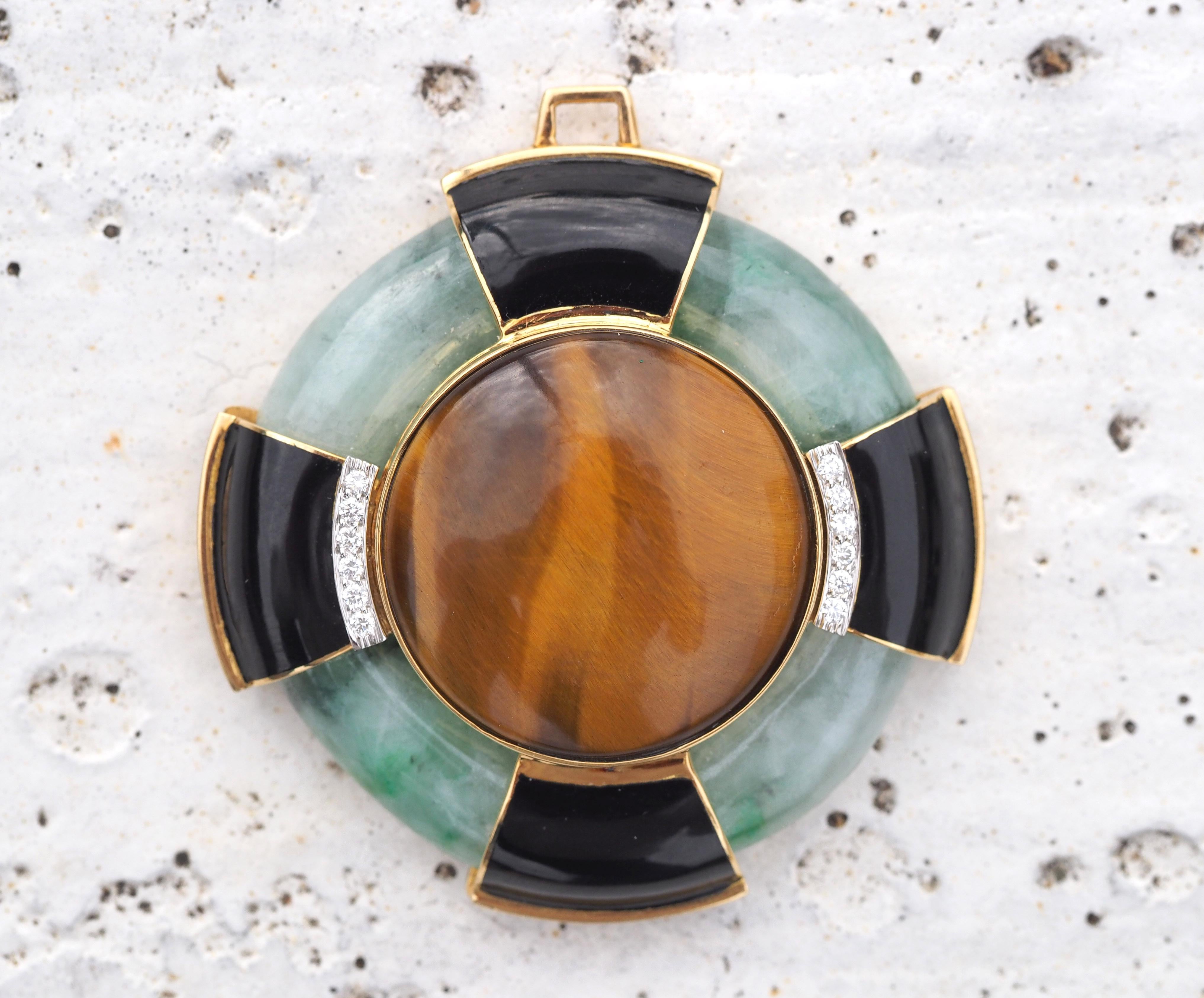 Vintage David Webb Authentic 18k Yellow Gold and Platinum Pendant with Tiger's Eye, Jade, Black Onyx, and Round Brilliant Cut Diamonds.

This unique piece is without a doubt, a 