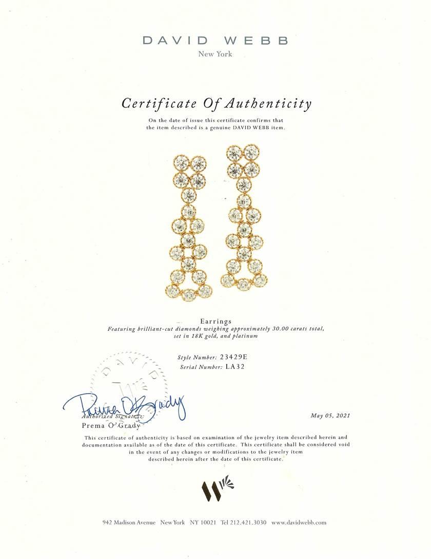 Dazzling earrings made of 18 karat yellow gold and set with round brilliant cut diamonds (F-G/VS, 30 carats total). The diamonds are set in platinum which accentuates their whiteness.
Comes with a David Webb Certificate of Authenticity.
The earrings