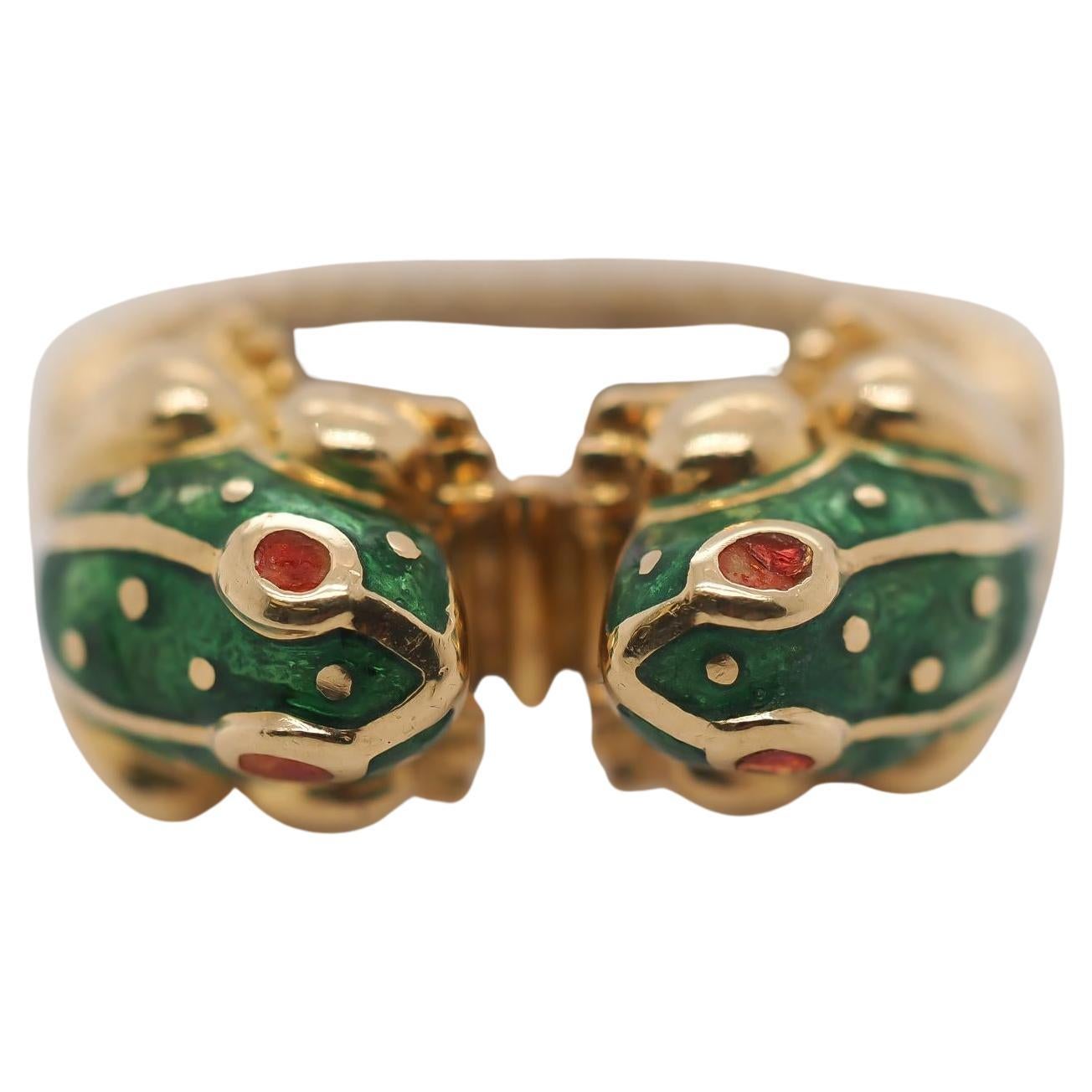 Year: 1980s
Item Details:
Ring Size: 6
Metal Type: 18K Yellow Gold [Hallmarked, and Tested]
Weight: 13.9 grams
Maker: David Webb
*Enamel is in great condition
Band Width: 5.25mm
Condition: Excellent