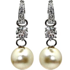 Boucles d'oreilles pendantes vintage David Webb en platine, perles et diamants