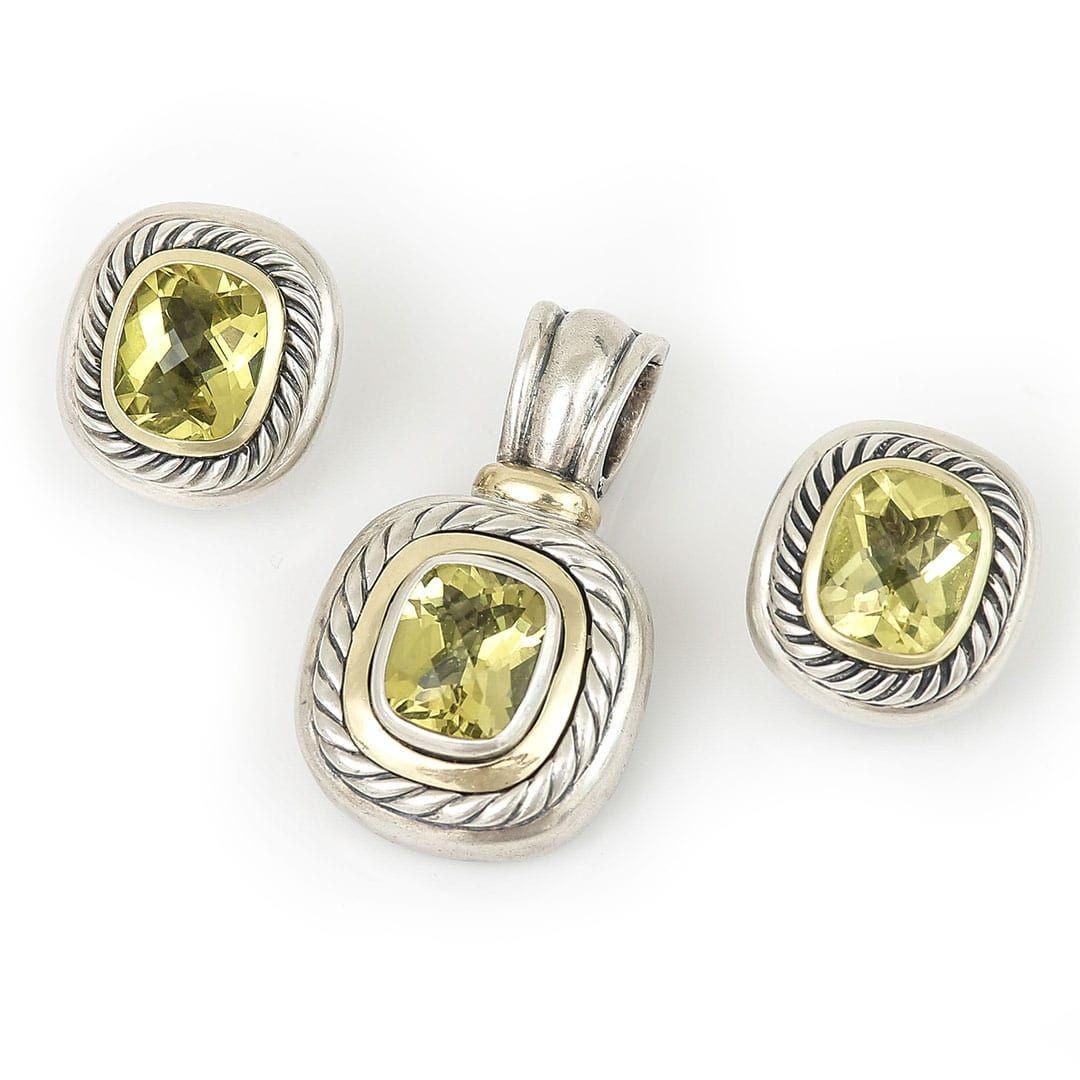 A stylish designer set by David Yurmna, New York comprising of a 14k gold and silver large peridot set pendant and earring suite circa 1990. The two tone pendant and earrings make for a fashionable set to wear with other silver or gold pieces, while