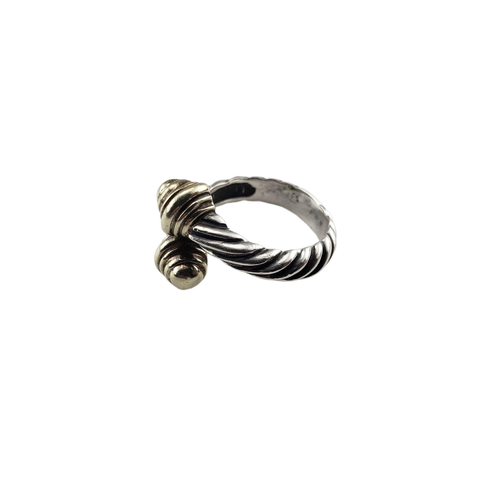 intage David Yurman Sterling Silver and 14 Karat Yellow Gold Bypass Cable Ring Size 5:

This elegant ring by David Yurman is crafted in meticulously detailed sterling silver and 14K yellow gold. Width: 13 mm. Shank: 4 mm.

Ring Size: 5

Weight: 3.0