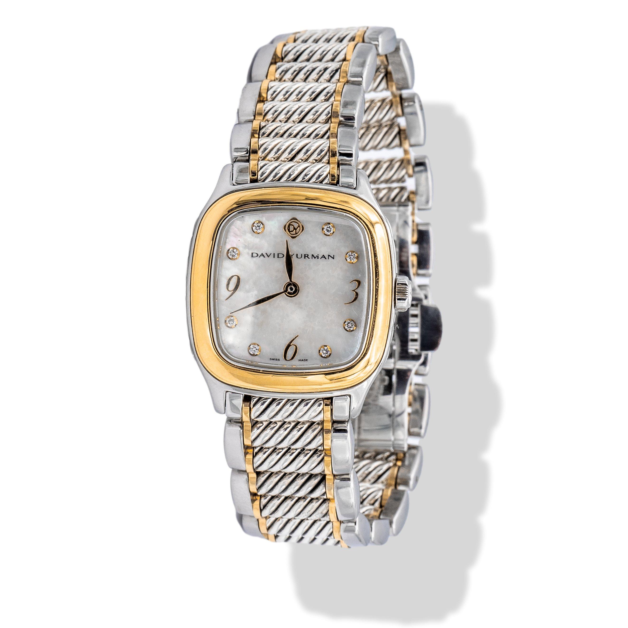 Vintage David Yurman Sterling Silver and Gold Cable Link watch with sapphire crystal is a timepiece that combines classic design elements with modern materials. The watch features a cable link bracelet made of stainless steel and 18K yellow gold,