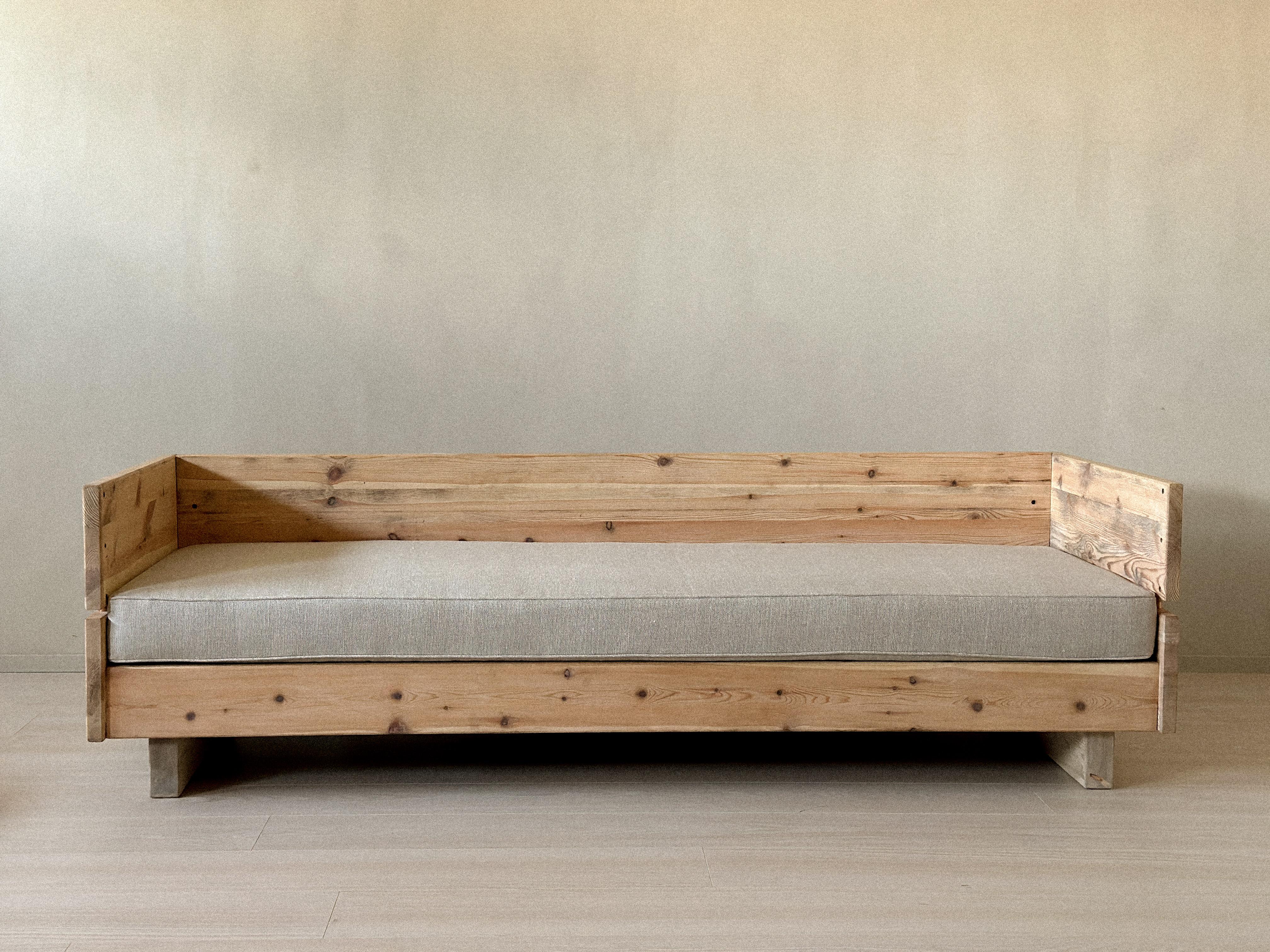 Vintage Daybed in the Style of Donald Judd, c. 1970s. Constructed from solid pine with a new linen cushion. Wear consistent with age and use, including marks, scratches, and minor dents.