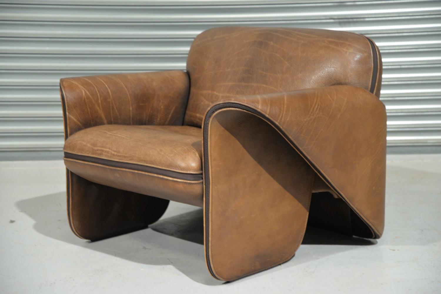 Discounted airfreight for our International customers (from 2 weeks door to door)

Ultra rare vintage De Sede DS 125 armchair by Gerd Lange in 1978. These sculptural pieces are upholstered in 3mm-5mm thick neck leather with a decorative zipper
