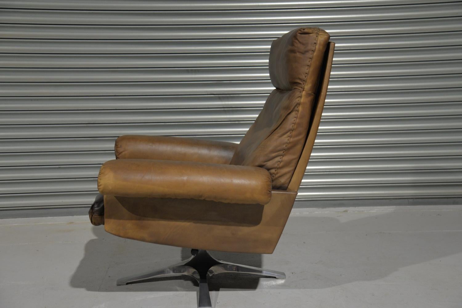 Vintage De Sede DS 31 Hochlehner-Drehsessel mit Ottomane, 1970er Jahre (Leder) im Angebot