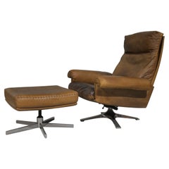 Vintage De Sede DS 31 Hochlehner-Drehsessel mit Ottomane, 1970er Jahre