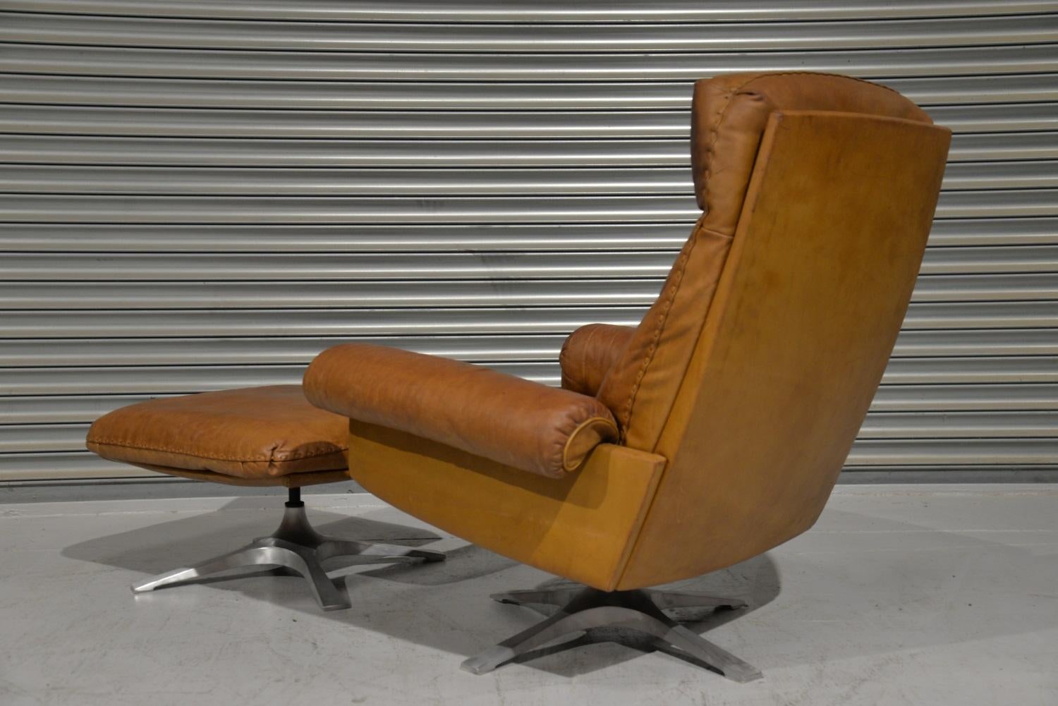 Mid-Century Modern Vintage De Sede DS 31 Leather Swivel Armchair with Ottoman, Switzerland 1970s For Sale