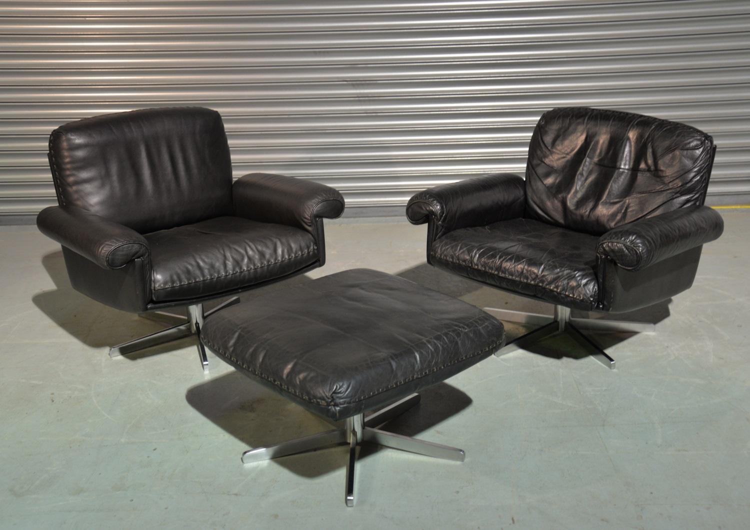 Discounted airfreight for our International customers ( from 2 weeks door to door ) 

We are delighted to bring to you a pair of ultra rare vintage 1970s de Sede DS 31 lounge armchairs and ottoman in stunning black aniline leather with superb