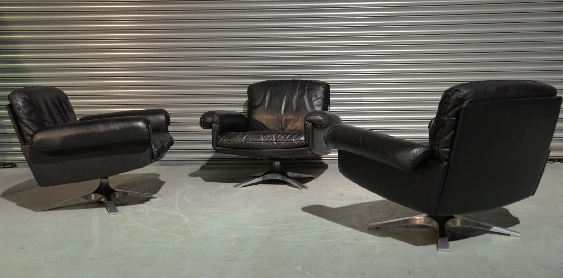 Discounted airfreight for our US and International customers ( from 2 weeks door to door)

We are delighted to bring to you three highly desirable vintage de Sede DS-31 swivel lounge armchairs in beautiful stunning black aniline leather with