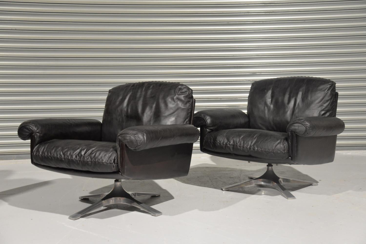 Discounted airfreight for our US and International customers (from 2 weeks door to door)

We are delighted to bring to you a pair of highly desirable retro De Sede DS-31 swivel lounge armchairs in beautiful soft dark brown leather with whipstitch