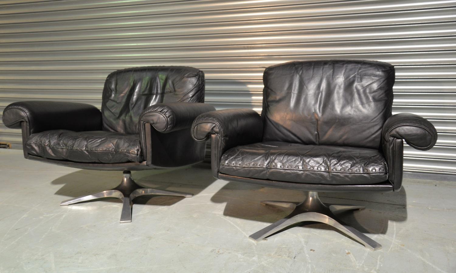 Discounted airfreight for our US Continent and International customers (from 2 weeks door to door)

We are delighted to bring to you a pair of highly desirable vintage De Sede DS-31 swivel lounge armchairs in stunning soft black aniline leather with