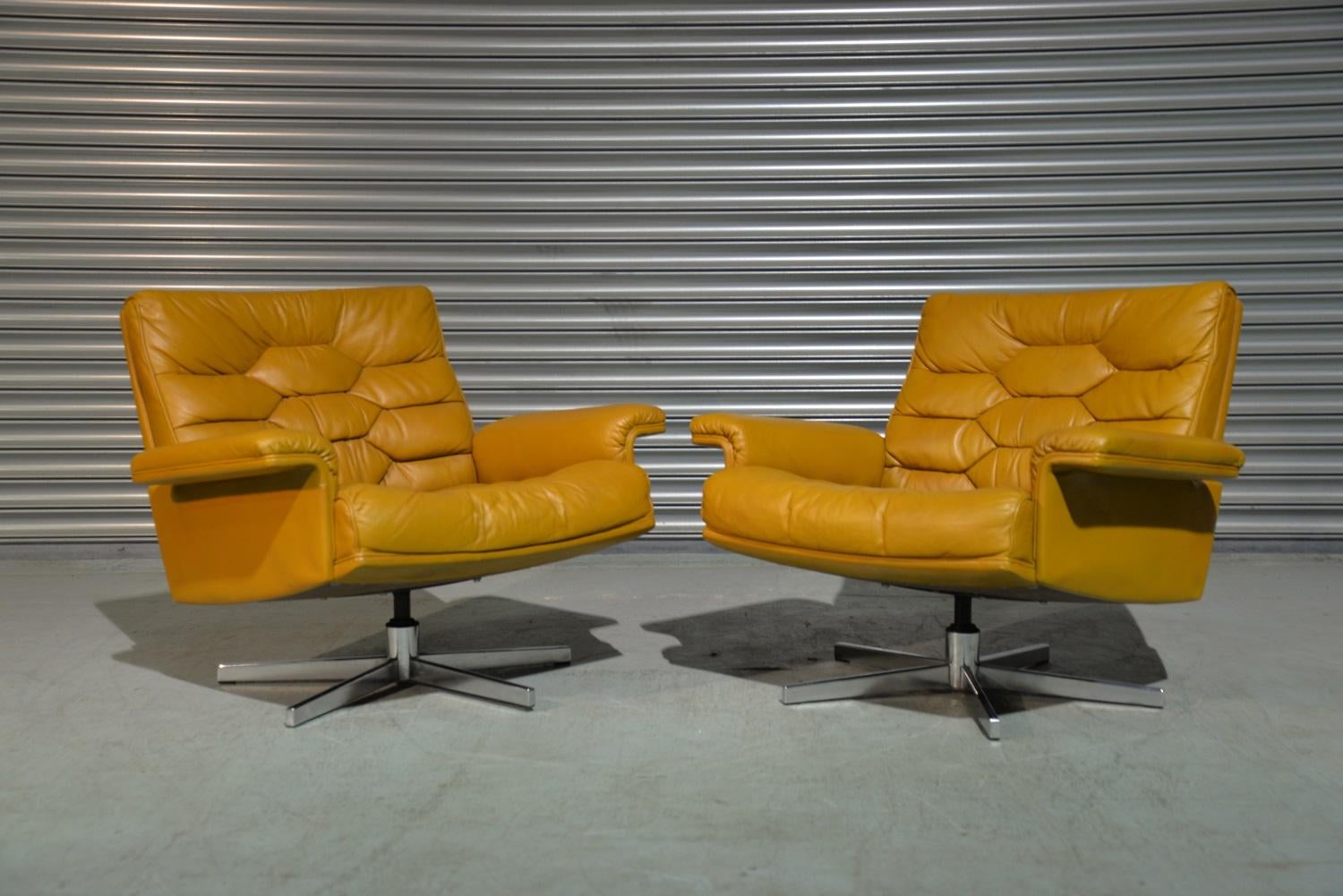 Discounted airfreight for our US and International customers ( from two weeks door to door ) 

We are delighted to bring to you an ultra-rare and highly desirable pair of De Sede Executive swivel lounge armchairs. Built in the 1970`s by De Sede