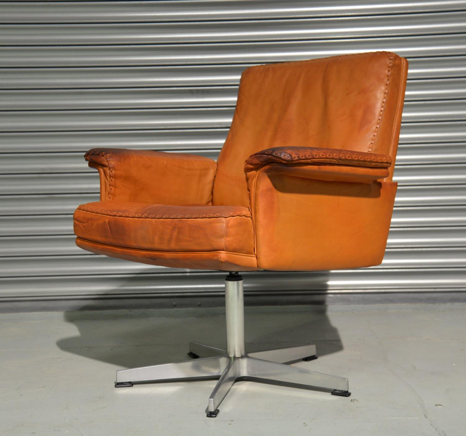 Discounted shipping rates for our US and International customers ( from 2 weeks door to door ) 

We are delighted to bring to you an extremely rare vintage de Sede DS 35 executive swivel armchair. Hand built in the 1960`s to incredibly high