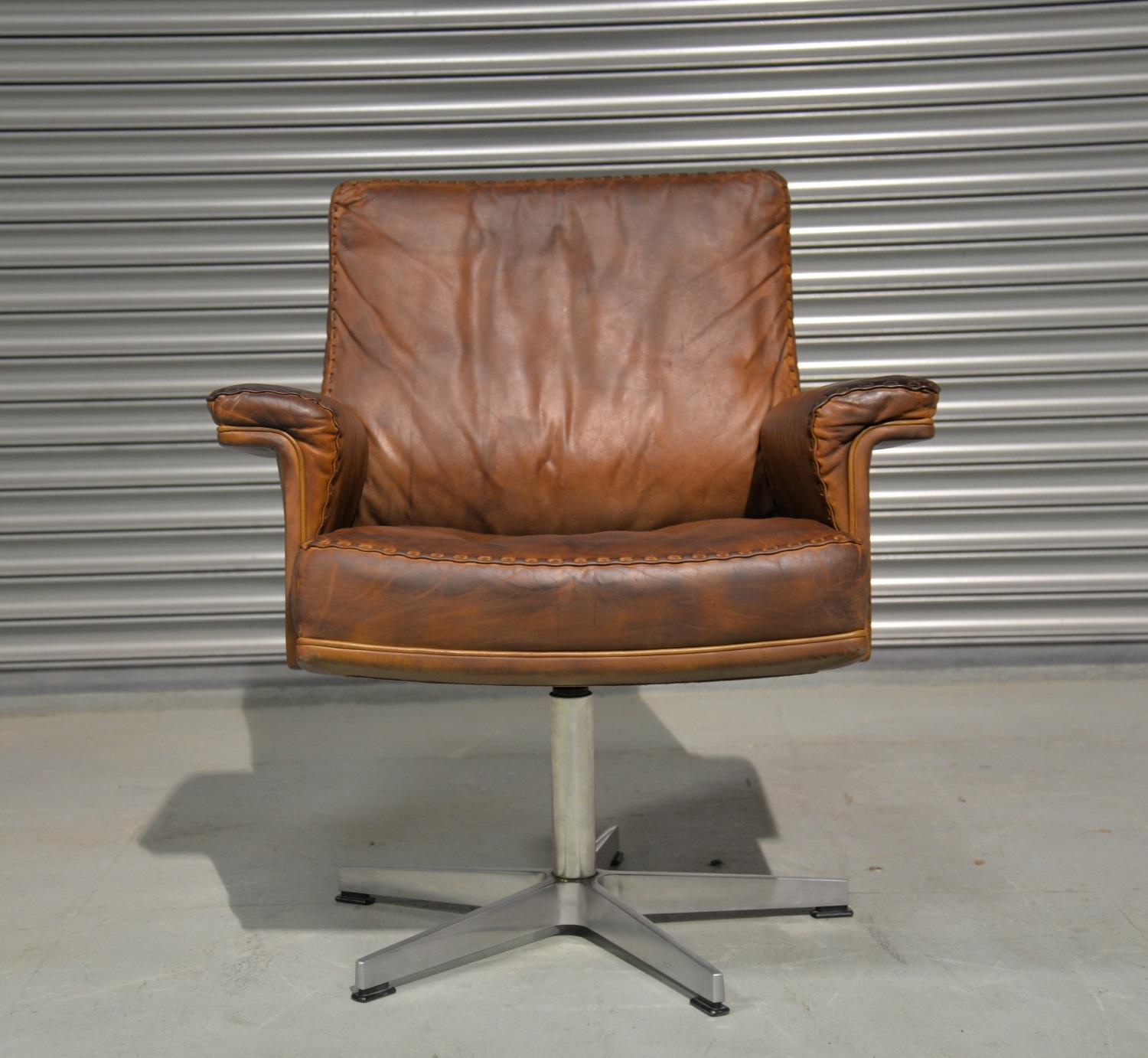 Discounted airfreight for our US and International customers ( from 2 weeks door to door)

We are delighted to bring to you an extremely rare vintage de Sede DS 35 executive swivel armchair. Hand built in the 1960`s to incredibly high standards by