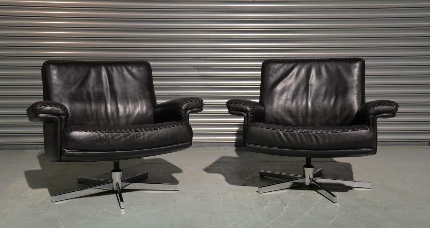 Discounted airfreight for our US and International customers ( from 2 weeks door to door)

We are delighted to bring to you an ultra-rare and highly desirable pair of black executive de Sede swivel lounge armchairs. Built in the 1970`s by de Sede