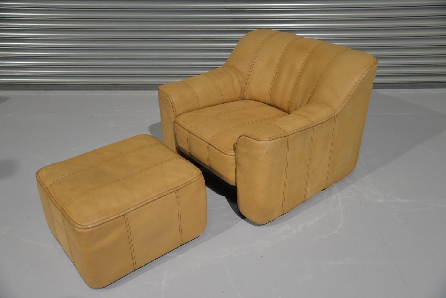 Discounted airfreight for our International customers (from 2 weeks door to door).

We are delighted to bring to you a vintage 1970s De Sede DS 44 armchair and matching ottoman in thick buffalo leather with handstitched detail. This vintage lounge
