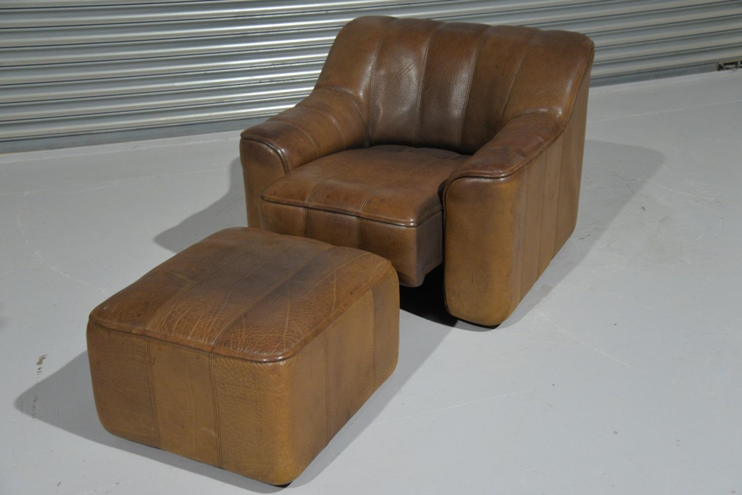 Discounted airfreight for our International customers (from 2 weeks door to door)

We are delighted to bring to you a vintage 1970s De Sede DS 44 armchair and matching ottoman in thick buffalo leather with hand stitched detail. This vintage lounge